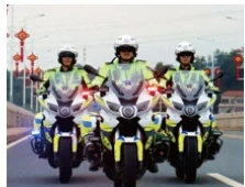 Police motorcycle unit using two-way radios